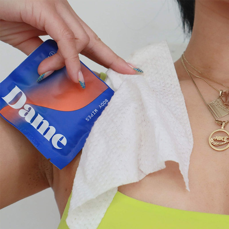Woman holding Multi-Purpose Body Wipes | Dame - Sachet