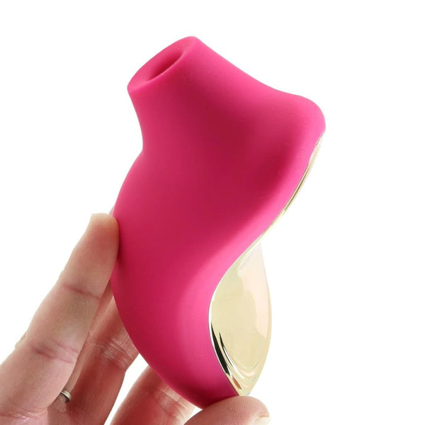 Sona 2 Sonic Clitoral Massager | Lelo - Cerise in hand 